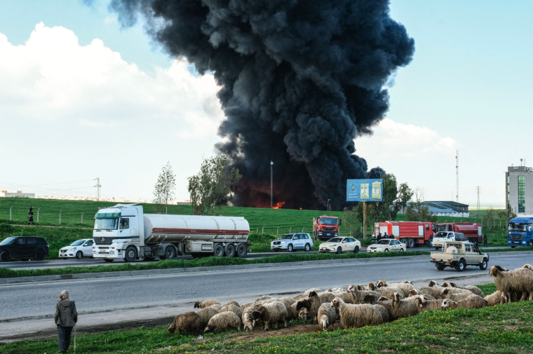 Smoke rises from an oil warehouse on the outskirts of Erbil, the capital of Iraq's Kurdistan Region, following a suspected drone strike on April 1, 2026. Gailan Haji / Middle East Images / AFP via Getty Images