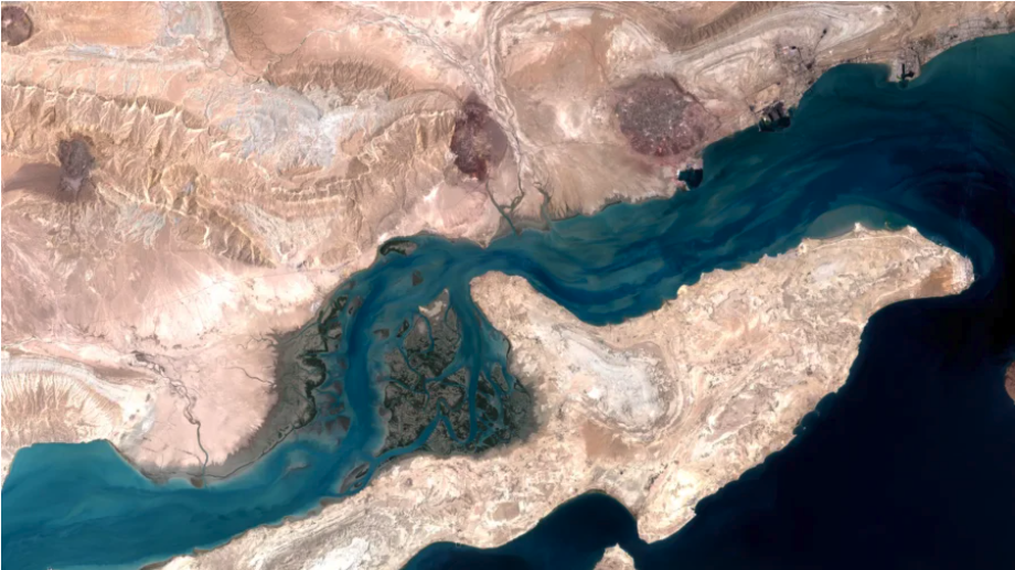A satellite image shows Qeshm Island at the mouth of the Strait of Hormuz in the Persian Gulf, on Aug. 23, 2000. (NASA/Public Domain/CC0)