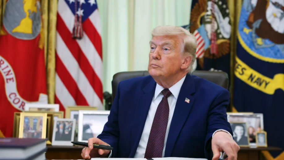 U.S. President Donald Trump prepares to sign an executive order during an event in the Oval Office of the White House on June 3, 2026. (Kevin Dietsch/Getty Images)