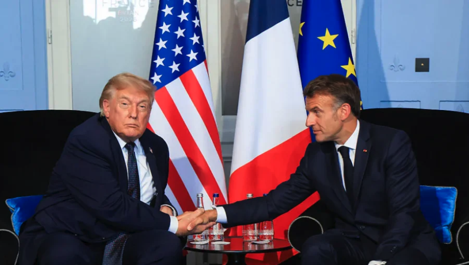 U.S. President Donald Trump (L) shakes hands with France's President Emmanuel Macron during a bilateral meeting on the sidelines of the G7 summit, in Evian, central-eastern France, on June 15, 2026. (Ludovic Marin/Pool/AFP via Getty Images)