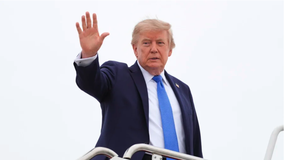 President Donald Trump waves as he boards Air Force One at Joint Base Andrews, Md., on Aug. 14, 2026. (Julia Demaree Nikhinson/AP Photo)