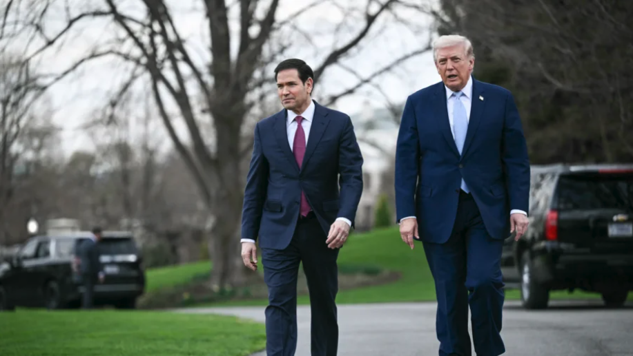 President Donald Trump walks with U.S. Secretary of State Marco Rubio near the South Lawn of the White House in Washington on March 20, 2026. (Brendan Smialowski/AFP via Getty Images)
