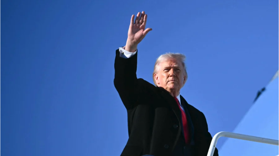 U.S. President Donald Trump waves as he boards Air Force One at Pope Army Airfield at Fort Bragg, N.C. on February 13, 2026, on his way to Palm Beach, Fla. to spend the weekend. (Mandel Ngan/AFP via Getty Images)