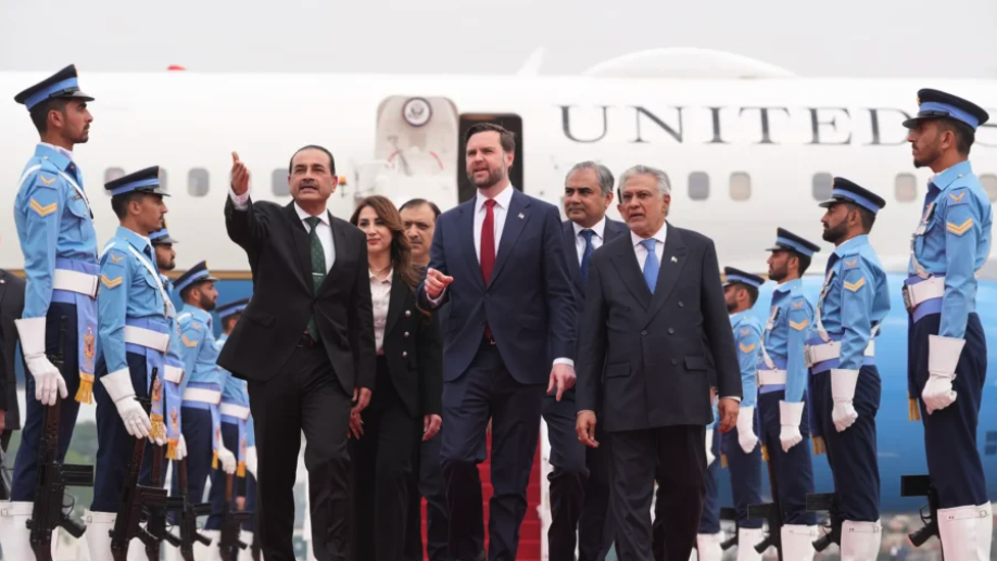 U.S. Vice President JD Vance, center, walks alongside Pakistan’s Army Chief Field Marshal Asim Munir, left, and Foreign Minister Ishaq Dar upon arrival in Islamabad, Pakistan, on April 11, 2026. (Jacquelyn Martin, Pool /AP Photo)