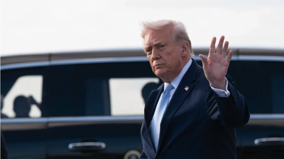 President Donald Trump waves after landing at Palm Beach International Airport in Palm Beach, Florida, on March 20, 2026. (Roberto Schmidt/Getty Images)