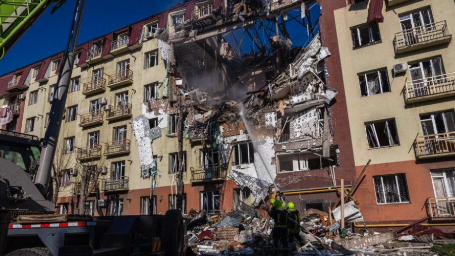 Ukrainian rescuers work at a site of a heavily damaged residential building following a massive strike in Odesa, Ukraine, on April 6, 2026. (Oleksandr Gimanov / AFP via Getty Images)