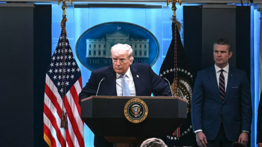 President Donald Trump, alongside Secretary of War Pete Hegseth (R), speaks about the conflict in Iran in the James S. Brady Press Briefing Room of the White House on April 6, 2026. (Brendan Smialowski/AFP via Getty Images)