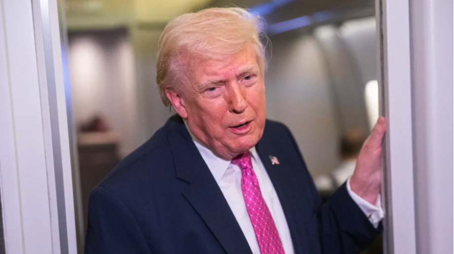 President Donald Trump speaks with members of the media onboard Air Force One while en route to Joint Base Andrews, Maryland from West Palm Beach Florida, on March 29, 2026. (Nathan Howard/Getty Images)