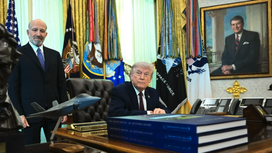 Secretary of Commerce Howard Lutnick (L) and President Donald Trump look on before signing an executive order on election integrity in the Oval Office of the White House on March 31, 2026. (Brendan Smialowski/AFP via Getty Images)