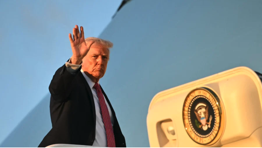 President Donald Trump boards Air Force One before departing Miami International Airport in Miami on March 27, 2026. (Mandel Ngan/AFP via Getty Images)
