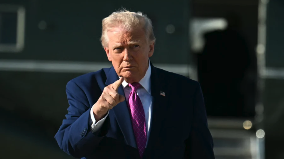 President Donald Trump gestures after stepping off Marine One at Joint Base Andrews, Md., on April 10, 2026. (Jim WATSON/AFP via Getty Images)