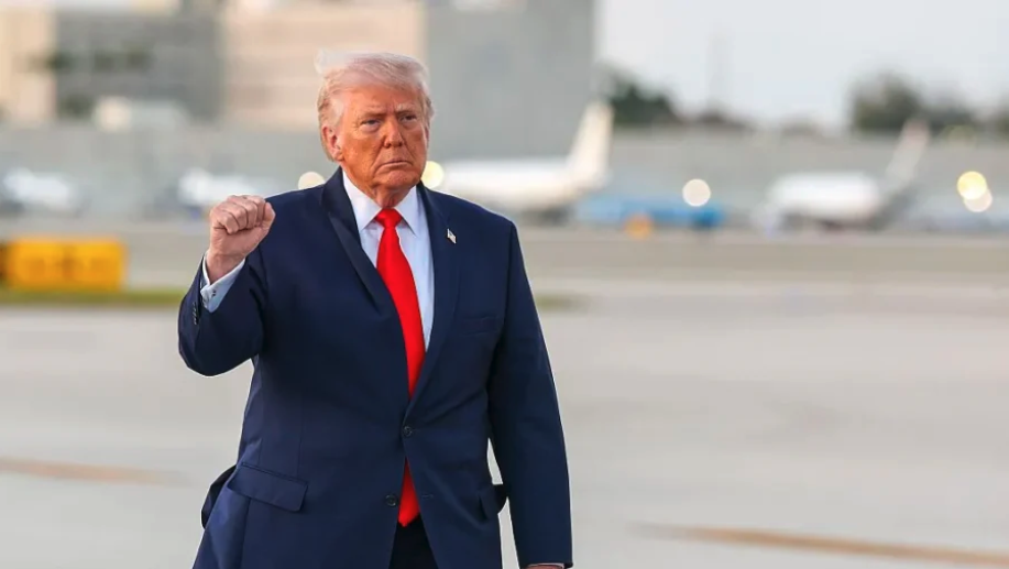 President Donald Trump waves to the media after walking off of Air Force One at Miami International Airport on April 11, 2026. (Tasos Katopodis/Getty Images)
