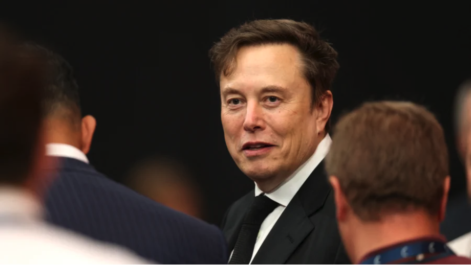 Tesla CEO Elon Musk attends the public memorial service for conservative activist Charlie Kirk at State Farm Stadium in Glendale, Ariz., on Sept. 21, 2025. (Patrick T. Fallon/AFP via Getty Images)