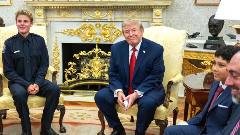 President Donald Trump meets with lifeguard Ryder Williams (L) in the Oval Office of the White House on Aug. 17, 2026. (Jim Watson/AFP via Getty Images)