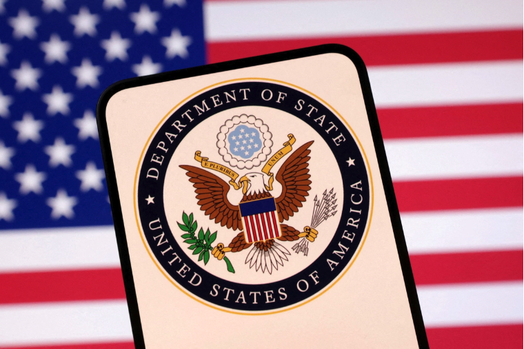 U.S. Department of State logo and U.S. flag are seen in this illustration created on April 23, 2025. Dado Ruvic/Illustration/File Photo/Reuters